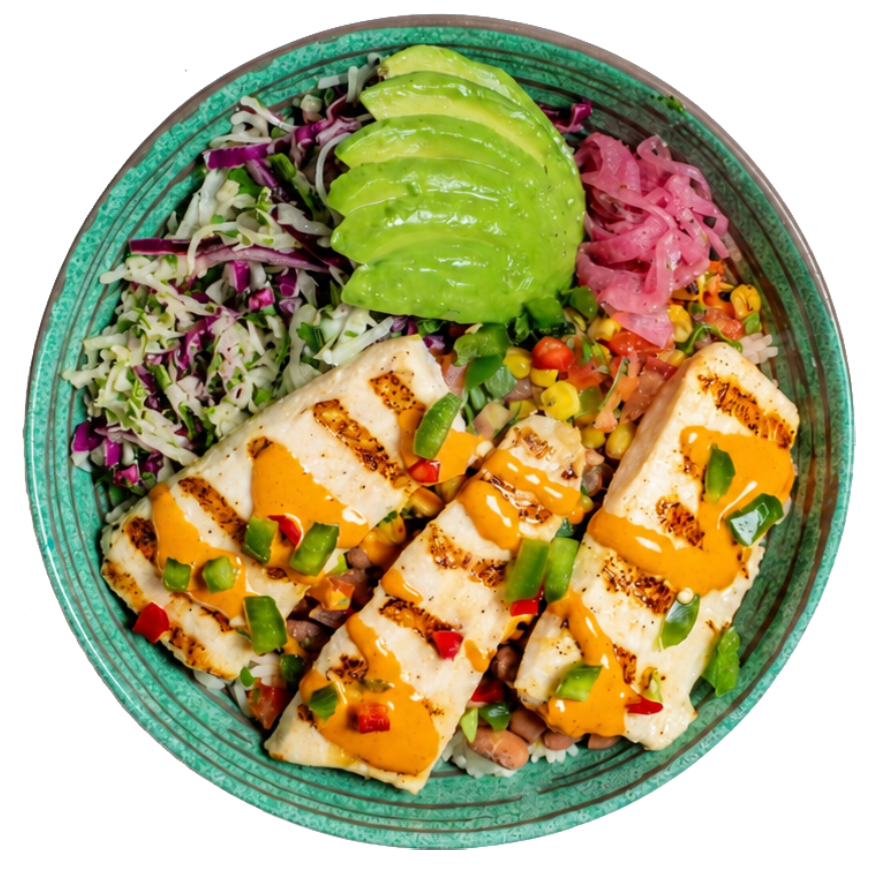 Two Coastal Power Mahi tacos with rice and beans on a blue ceramic plate